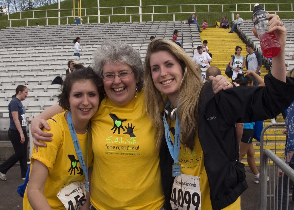 Lucy and Becca celebrating their successful run for SALVE with their mum Alison