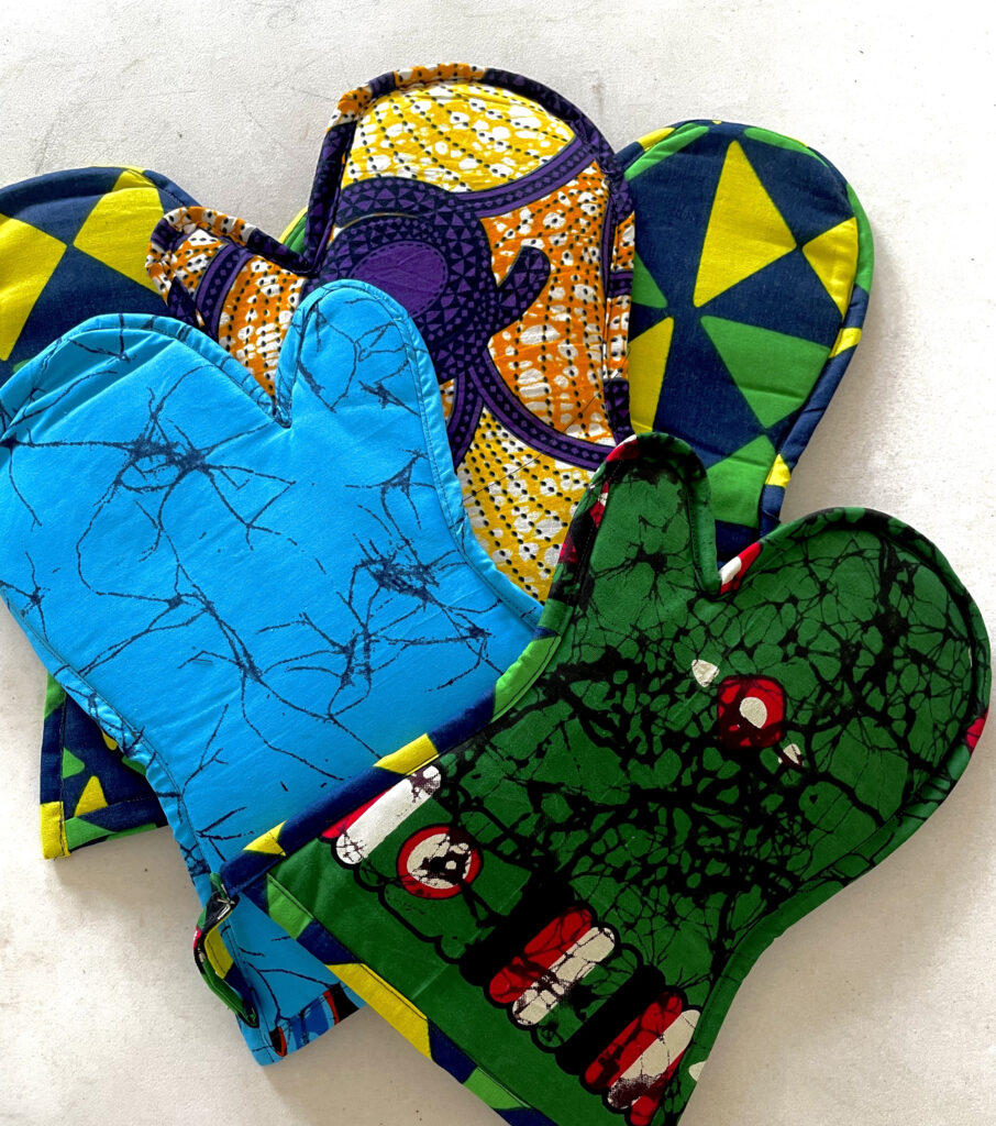 pile of oven gloves with different patterns