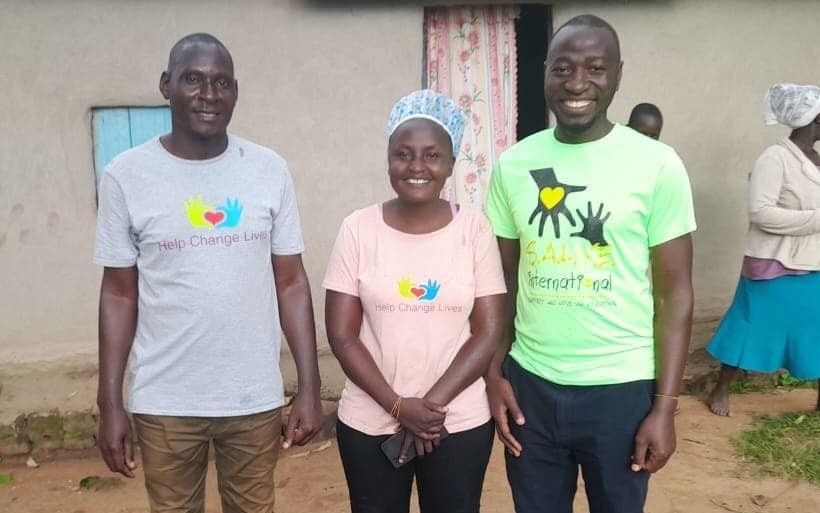 SALVE's Permaculture teacher, Joshua, smiling for a photo with the Help Change Lives team